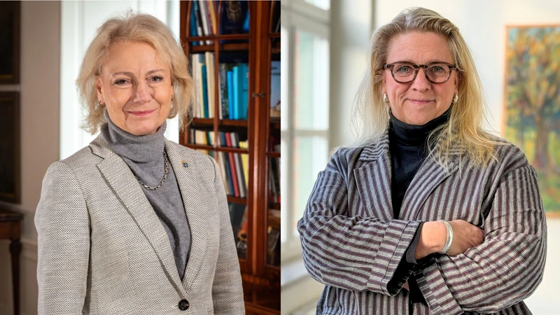 Två kvinnor som står bredvid varandra.