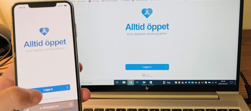 Bild på smarttelefon och dator som är på Alltid öppets webbplats